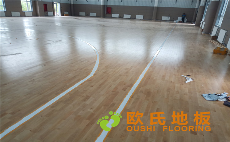 新疆克拉瑪依市獨山子虹園小區(qū)體育館木地板項目-歐氏運動木地板