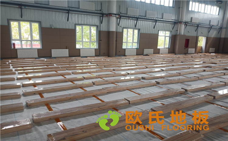 新疆克拉瑪依市獨山子虹園小區(qū)體育館木地板項目-歐氏運動木地板