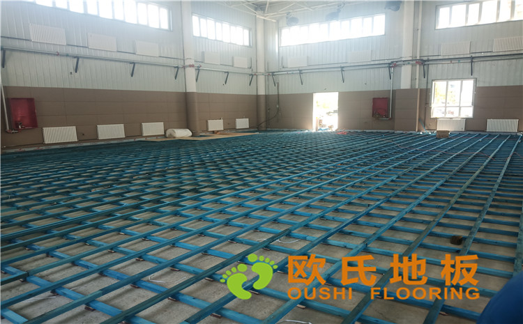 新疆克拉瑪依市獨山子虹園小區(qū)體育館木地板項目-歐氏運動木地板